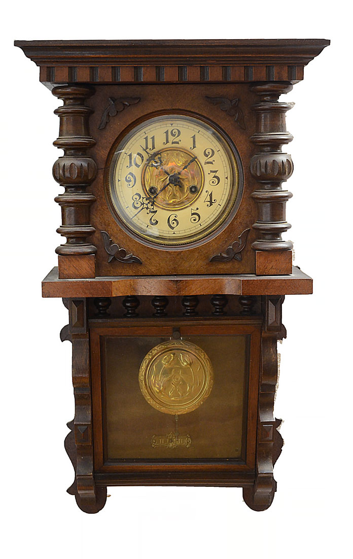 Appraisal: CARVED GERMAN WALL CLOCK Walnut case with applied carved decoration