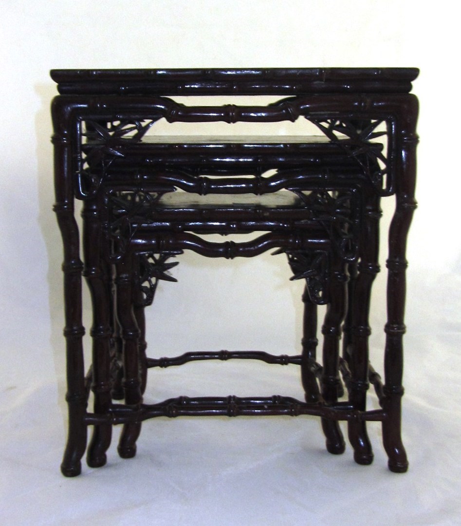 Appraisal: A Chinese wooden nest of three small tables th century