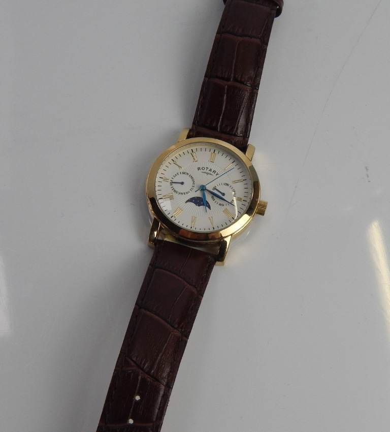 Appraisal: A Rotary gents wristwatch with date and day dials gold