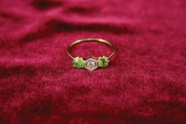 Appraisal: A three stone Ring the brilliant-cut diamond in hexagonal claw-setting