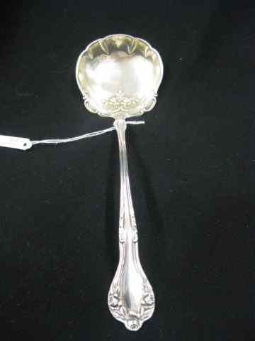 Appraisal: Victorian Sterling Silver Soup Ladle ornate floral gold wash bowl