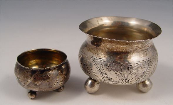 Appraisal: PIECE ENGRAVED RUSSIAN SILVER SALTS To include Master salt engraved