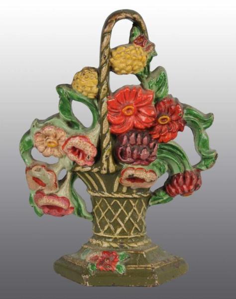 Appraisal: Cast Iron Dahlias Doorstop Description Made by Hubley cat Condition