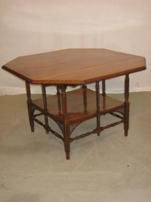 Appraisal: A VICTORIAN WALNUT CENTRE TABLE in the Aesthetic style moulded