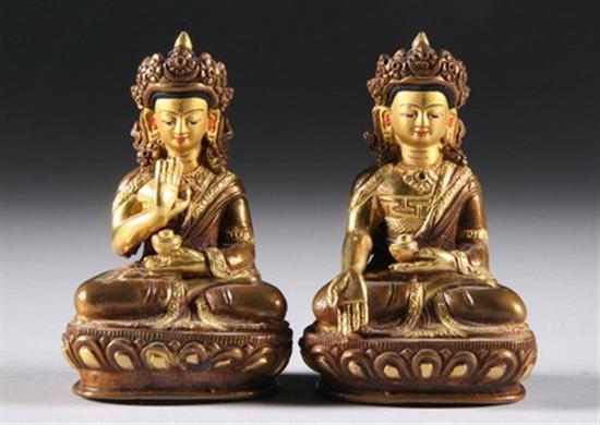 Appraisal: TWO SMALL TIBETAN GILT BRONZE FIGURES OF BUDDHA Crowned seated