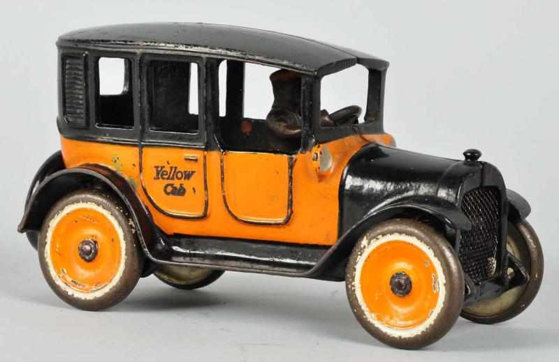 Appraisal: Cast Iron Arcade No Yellow Cab Toy Description American Rear