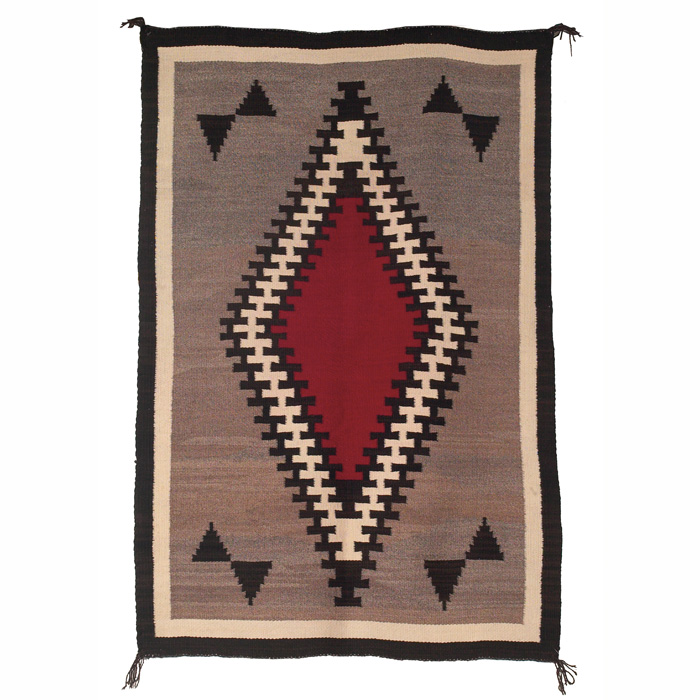 Appraisal: Navajo rug c diamond pattern in red brown cream and