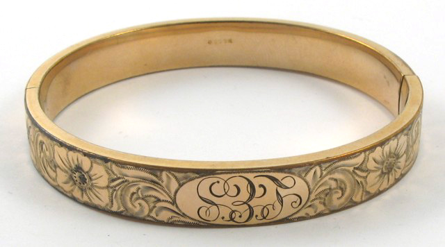 Appraisal: RUSSIAN TEN KARAT YELLOW GOLD BANGLE weighing grams Condition Report