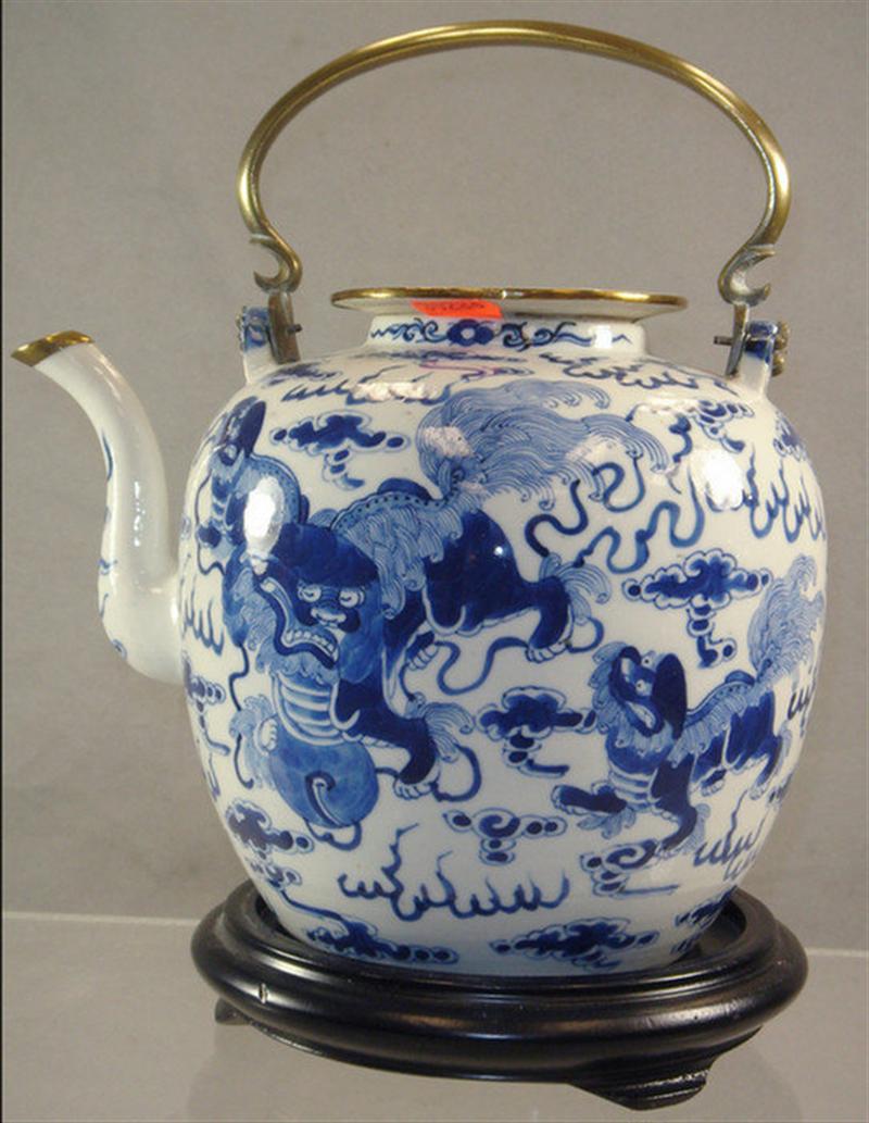 Appraisal: th c Chinese porcelain teapot with foo dogs and fitted