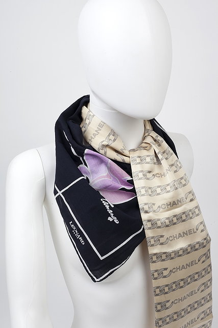 Appraisal: Two silk scarves the first a pale gold thin Chanel