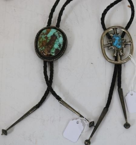 Appraisal: NAVAJO SILVER AND TURQUOISE BOLO TIES LEATHERWITH SILVER ENDS LONG