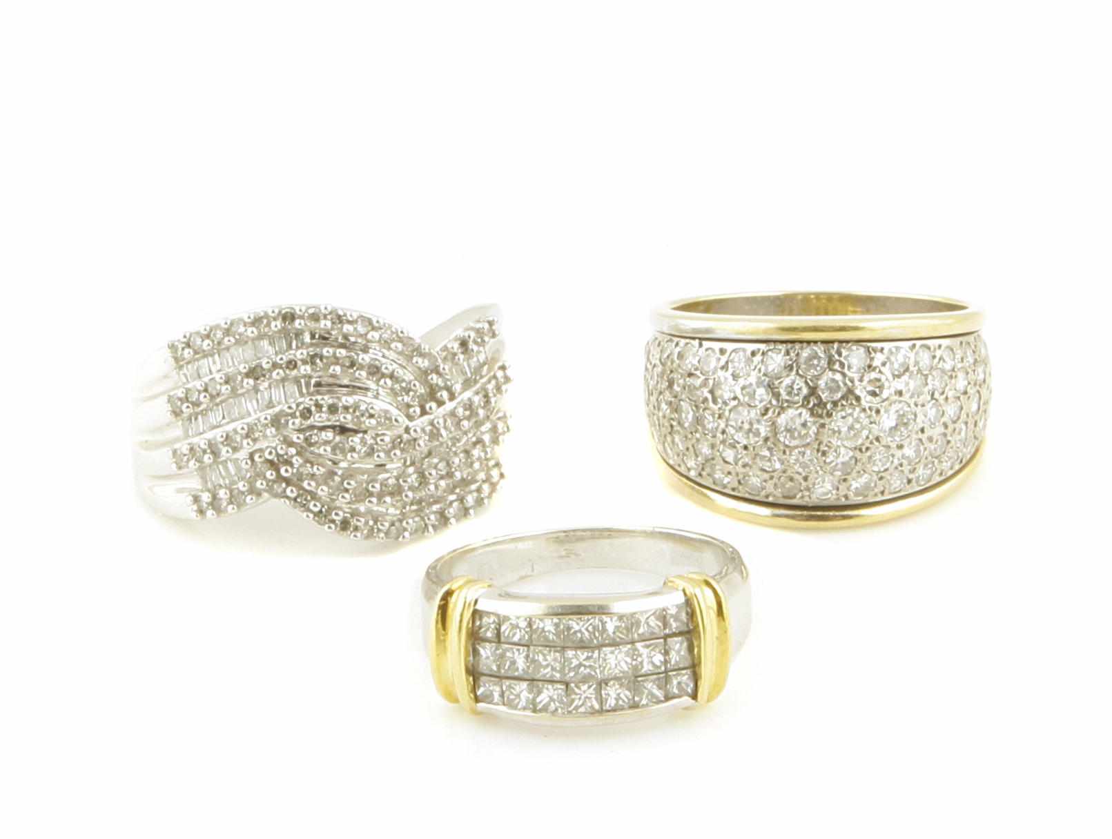 Appraisal: A collection of three diamond k and k gold rings