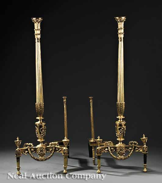 Appraisal: A Pair of Louis XVI-Style Brass Andirons of columnar form