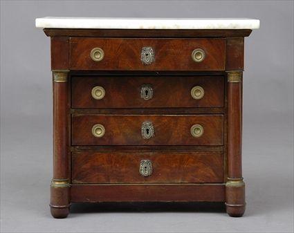 Appraisal: EMPIRE-STYLE MINIATURE CHEST OF DRAWERS The marble top above drawers