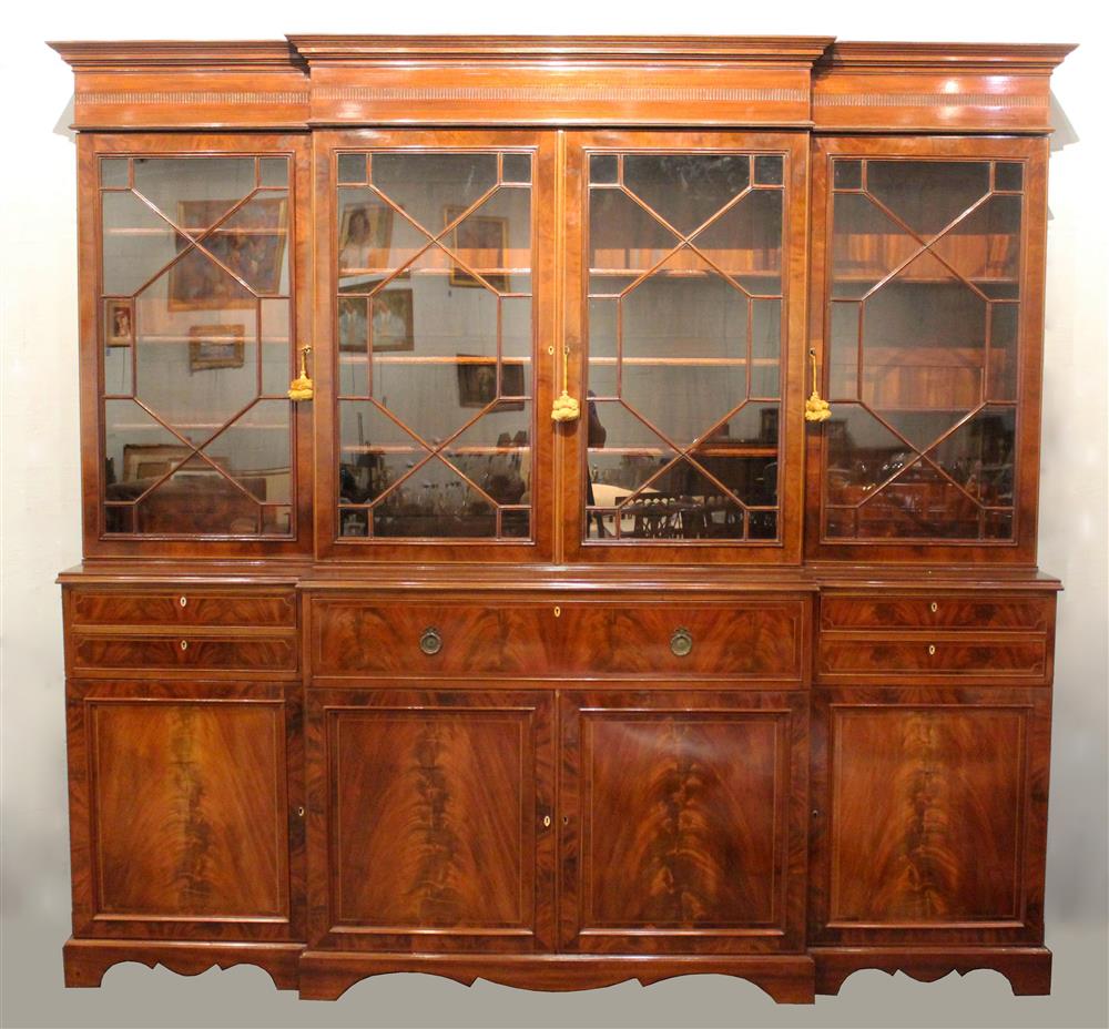 Appraisal: GEORGIAN STYLE INLAID MAHOGANY BREAKFRONT of typical form with a