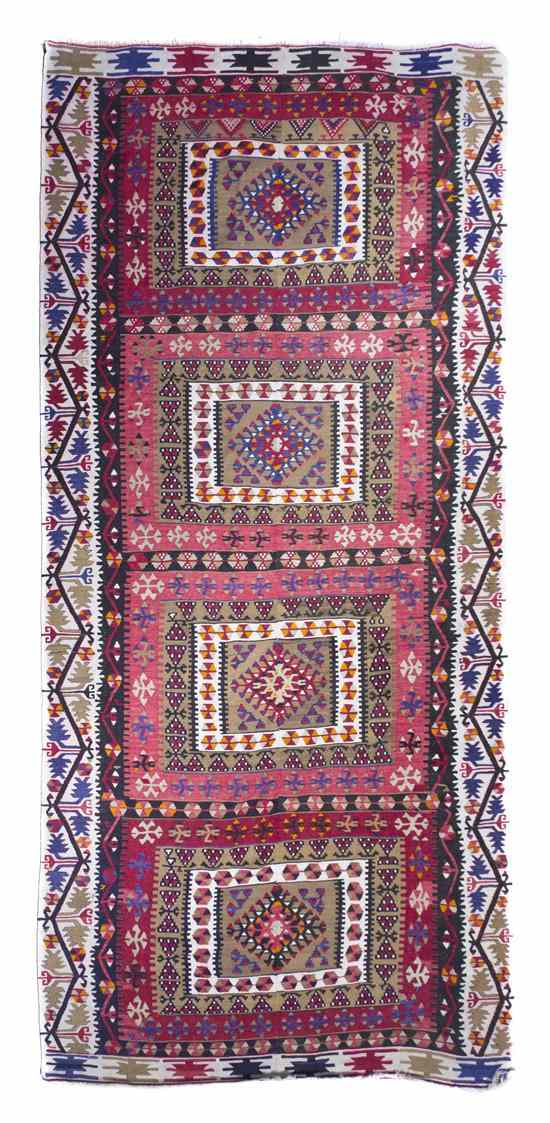 Appraisal: A Kilim Flatweave Wool Rug having four rectangular medallions on