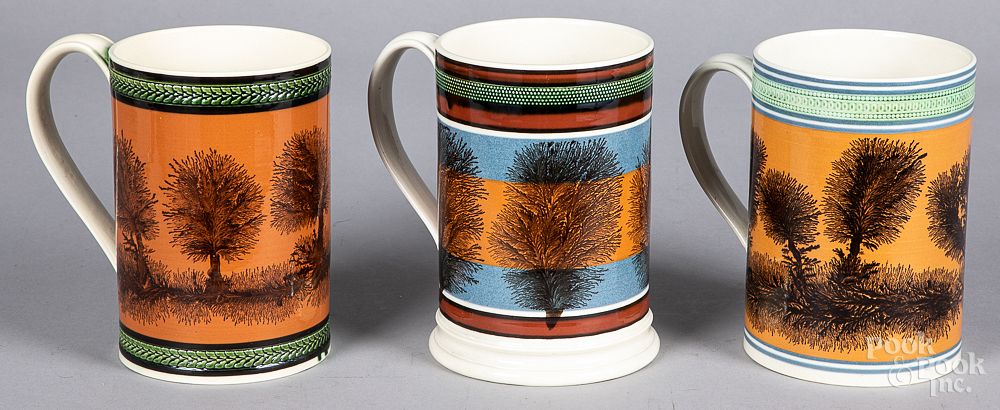 Appraisal: Three Don Carpentier mocha mugs Three Don Carpentier mocha mugs