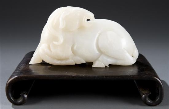 Appraisal: Chinese white jade carving of a reclining ''Lucky Animal'' with