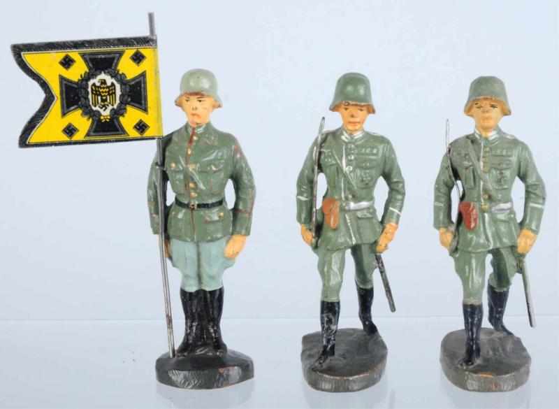 Appraisal: Elastolin German Pennant Bearer Officers Includes two German marching officers