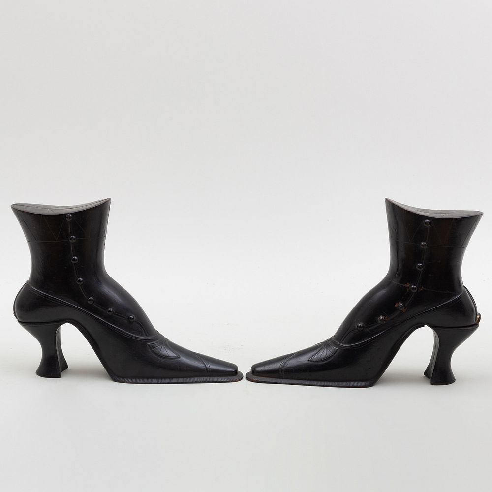 Appraisal: Pair of Victorian Ebonized Wood Boot Banks in high Applied