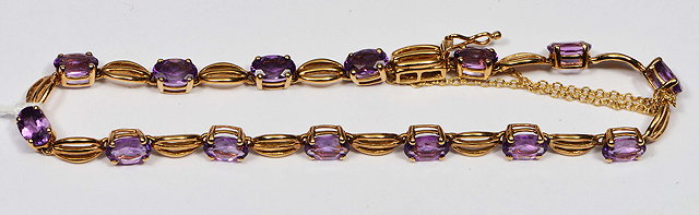 Appraisal: A CT GOLD BRACELET set with amethysts