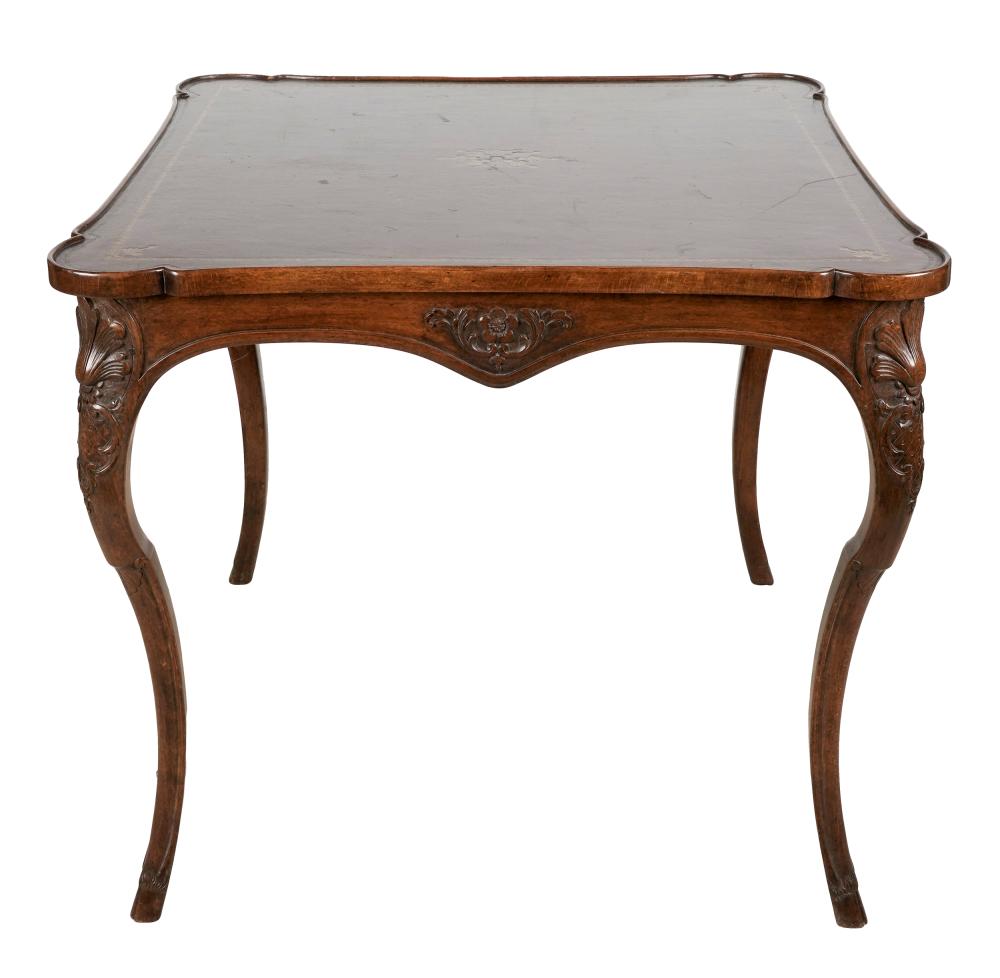 Appraisal: LOUIS XV PROVINCIAL STYLE LEATHER-INSET TABLEwith gilt-tooled designs to the