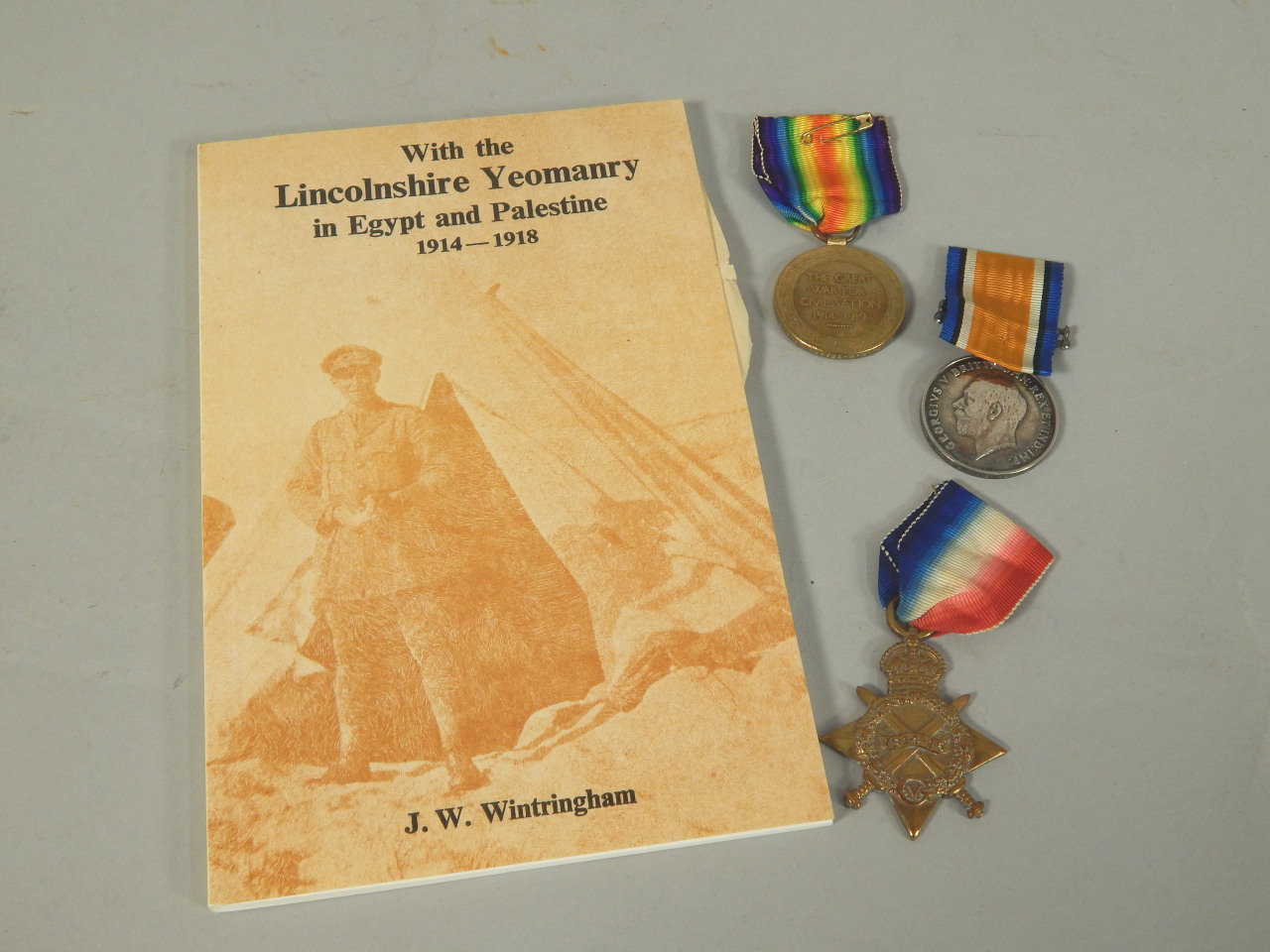 Appraisal: A First World War trio of medals awarded to a