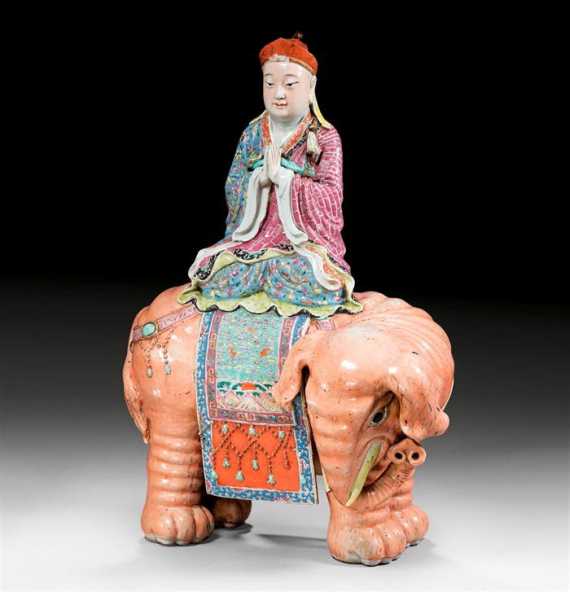 Appraisal: A FAMILLE ROSE FIGURE OF A MONK SEATED ON THE