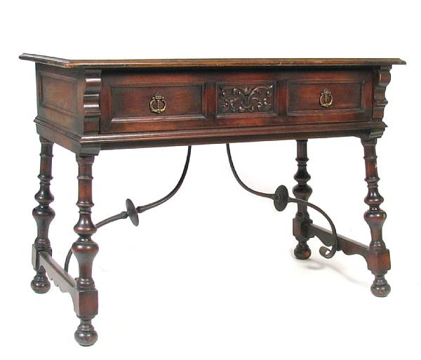 Appraisal: A Spanish Baroque style walnut table height in width in