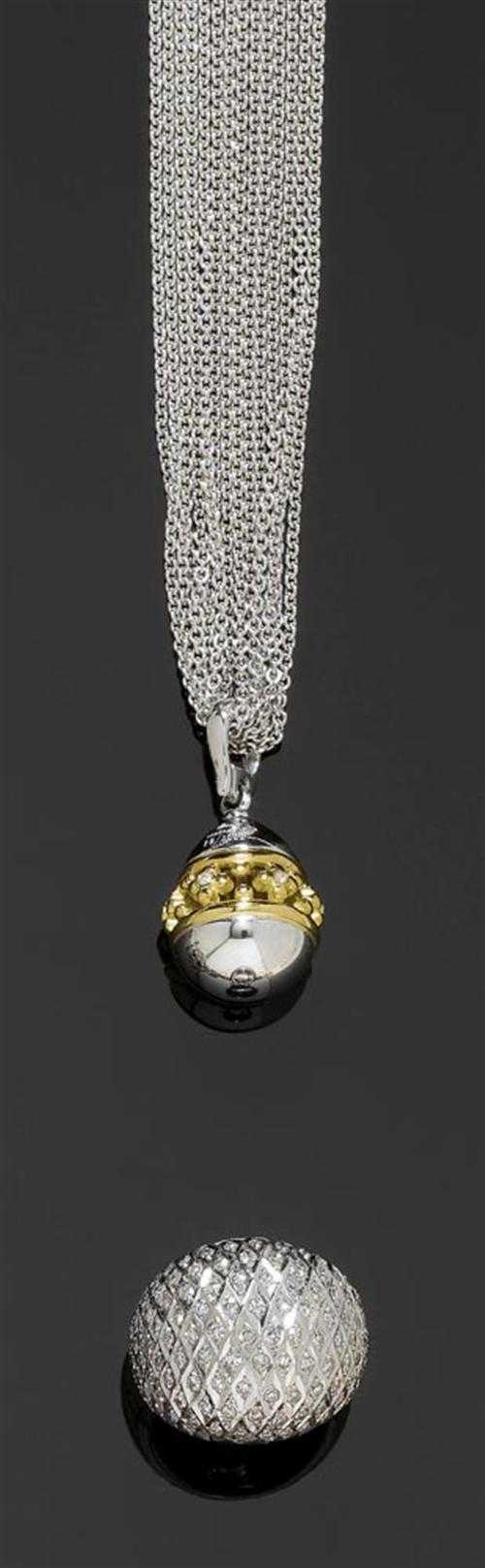 Appraisal: GOLD NECKLACE WITH FABERG PENDANT AND DIAMOND RING White gold