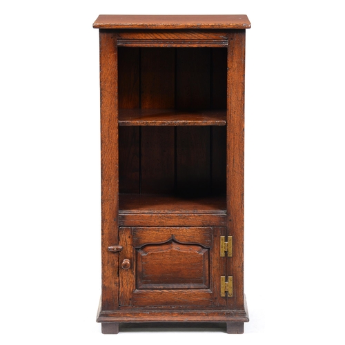 Appraisal: A Titchmarsh Goodwin oak dwarf open bookcase the ogee panel