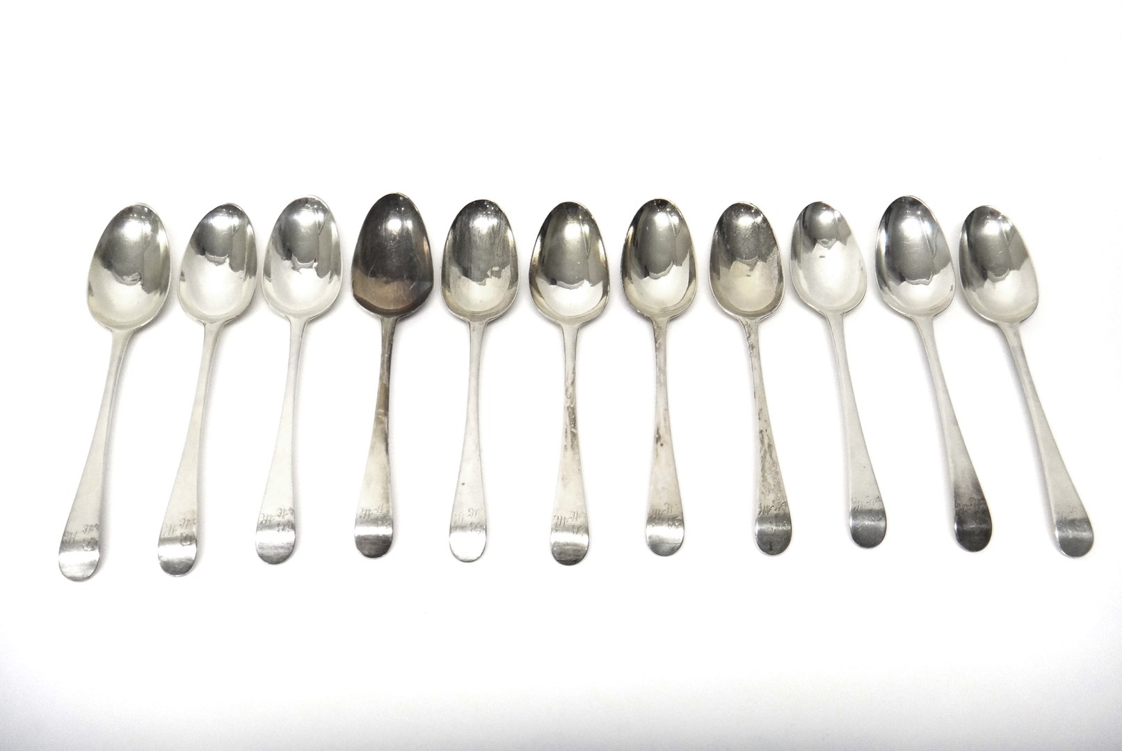 Appraisal: Seven silver bottom marked tablespoons London and four further silver