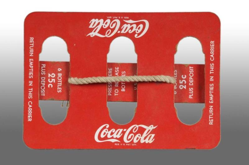 Appraisal: Masonite Coca-Cola -Bottle Carrier Description s Includes original rope handle