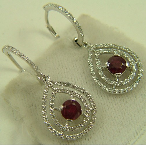 Appraisal: PAIR OF RUBY AND DIAMOND EARRINGS each K white gold