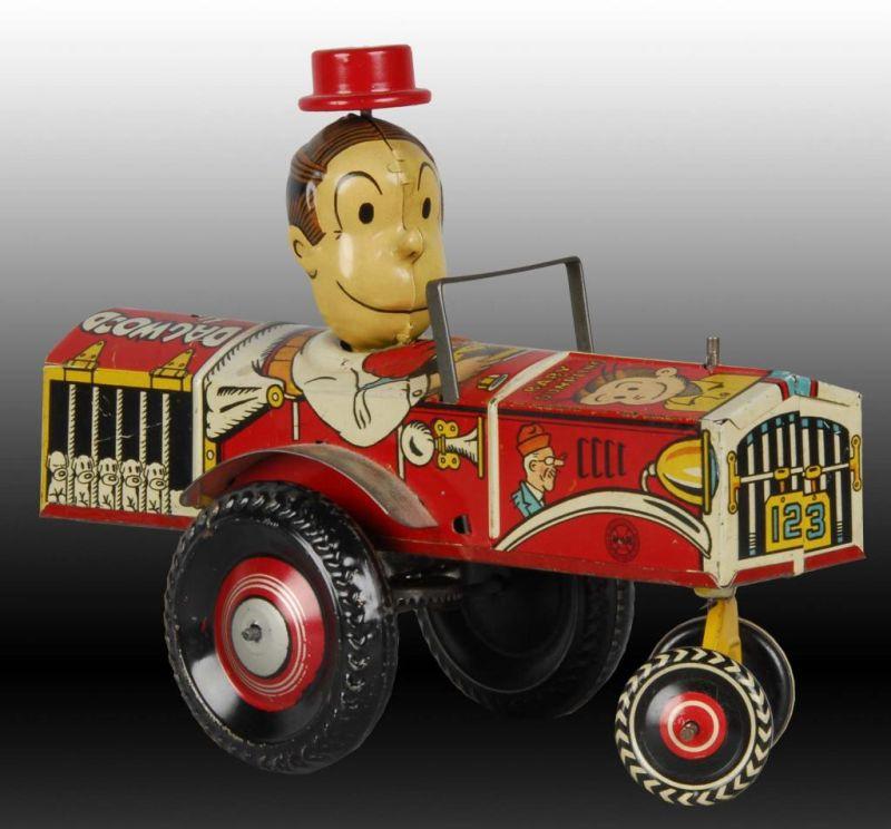 Appraisal: Marx Tin Wind-Up Dagwood the Driver Toy Description Working Marked