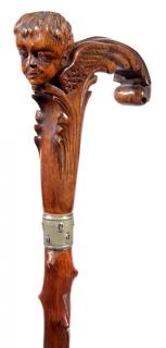 Appraisal: Classical Folk-Art Cane Ca A carved one-piece handle with a