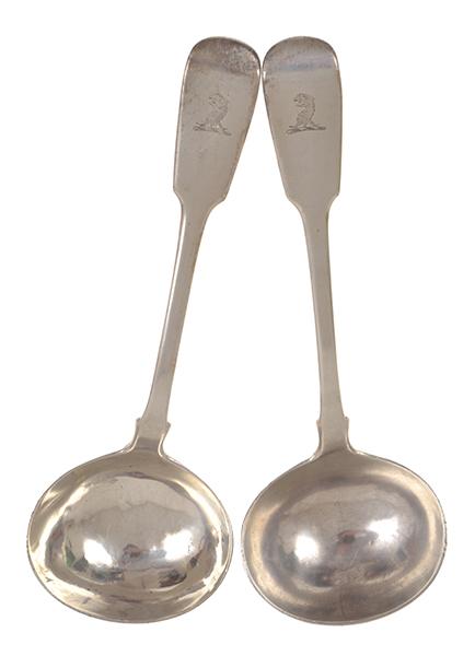 Appraisal: TWO GEORGIAN STERLING SAUCE LADELS