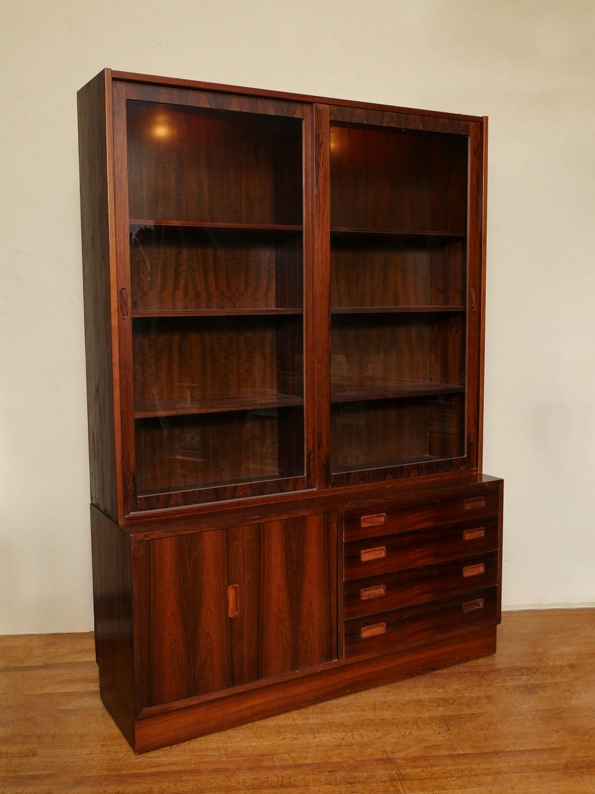 Appraisal: MID-CENTURY MODERN DANISH ROSEWOOD CHINA CABINET BY POUL HUNDEVAD Moderne