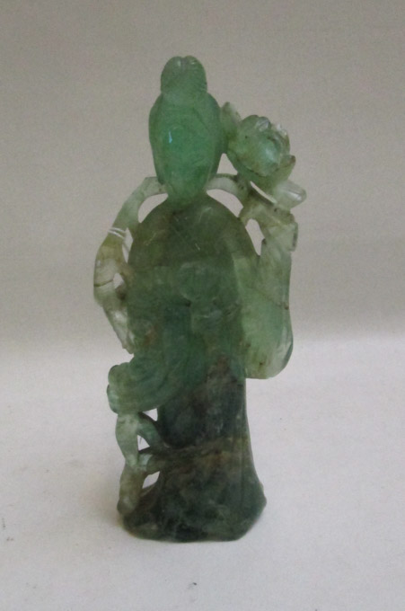 Appraisal: CHINESE GREEN TOURMALINE SCULPTURE of Guanyin standing figure with flowering