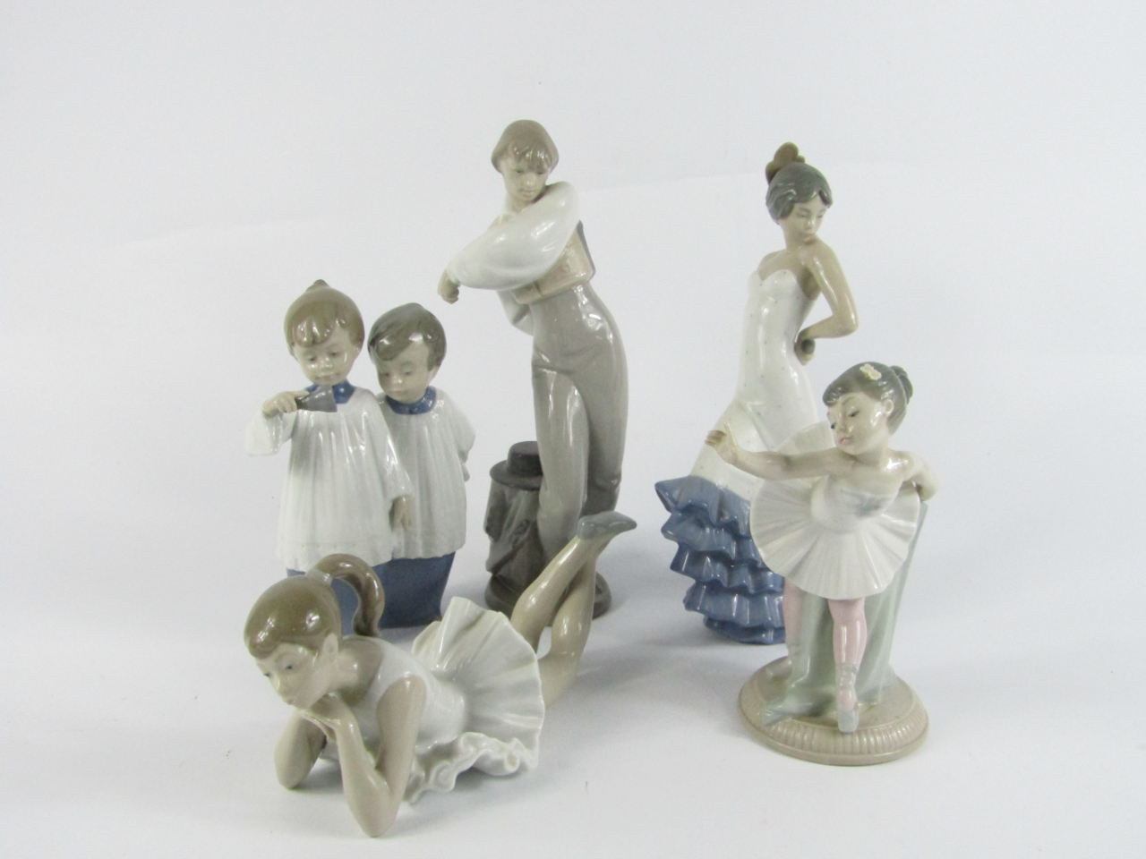 Appraisal: Five Lladro Nao porcelain figures comprising of a Flamenco girl