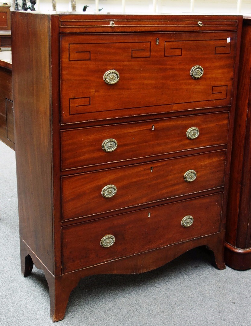 Appraisal: An early th century inlaid mahogany secretaire chest the fitted