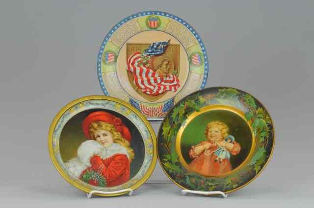 Appraisal: THREE C D KENNY COMPLIMENT TRAYS Lithographed tin very colorful