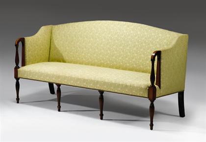 Appraisal: Federal inlaid mahogany sofa circa - The arched padded back