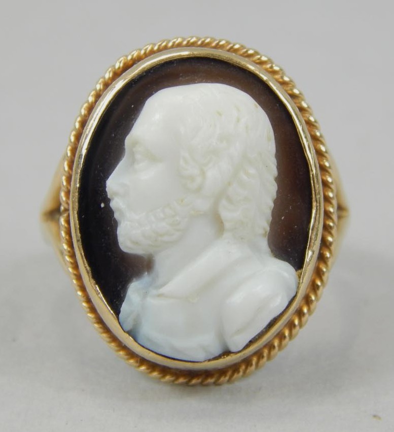 Appraisal: A hard stone cameo set signet ring yellow metal unmarked