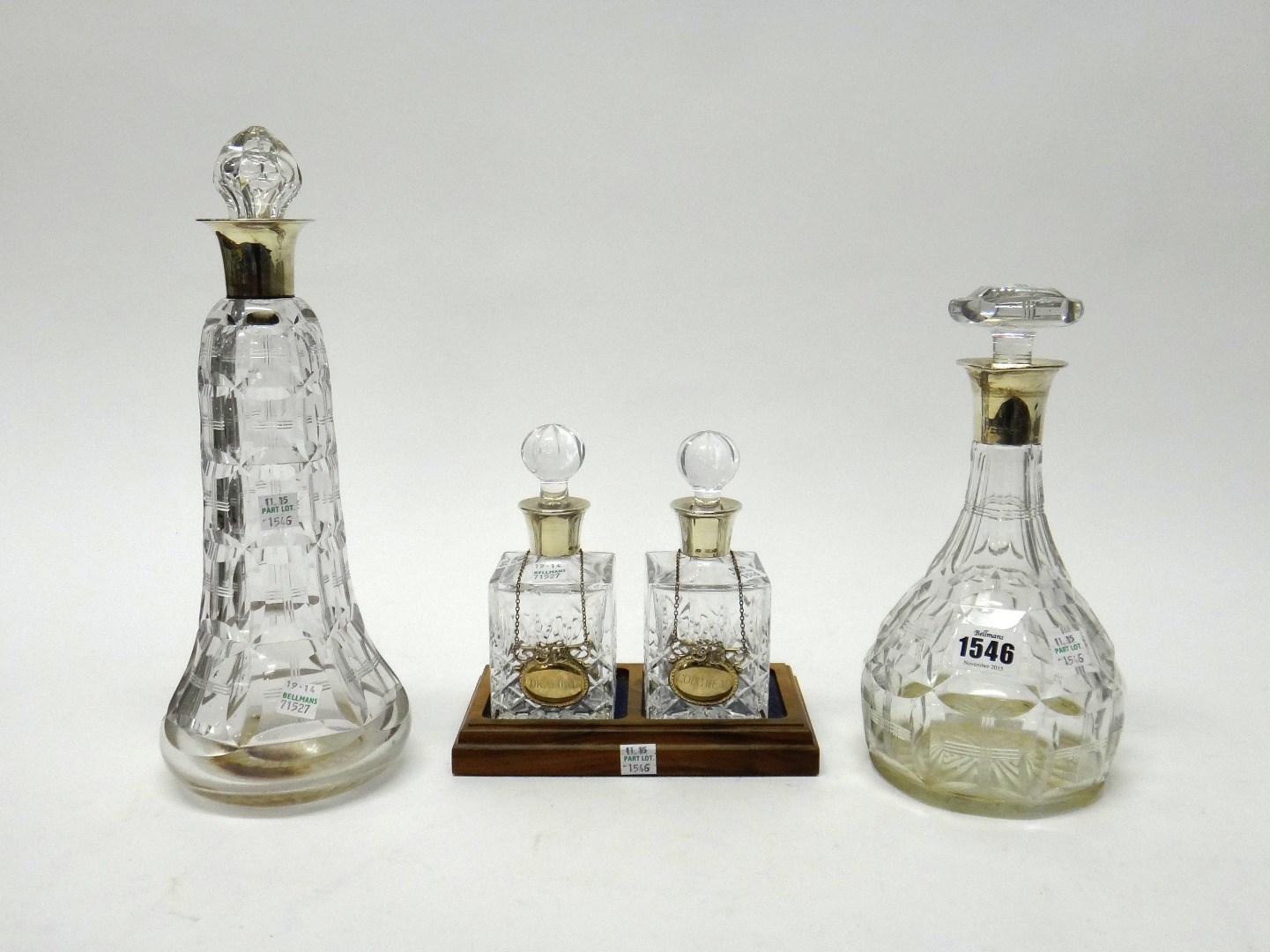 Appraisal: Two silver mounted faceted glass decanters including one London and