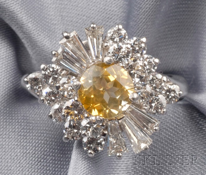 Appraisal: Platinum Yellow Sapphire and Diamond Ring prong-set with a circular-cut