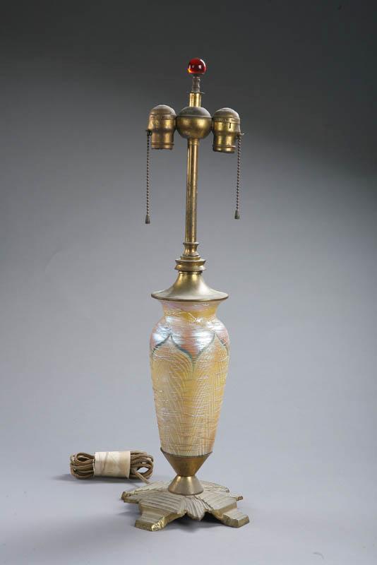 Appraisal: ART GLASS TABLE LAMP Attributed to Durand Iridescent gold vase-form