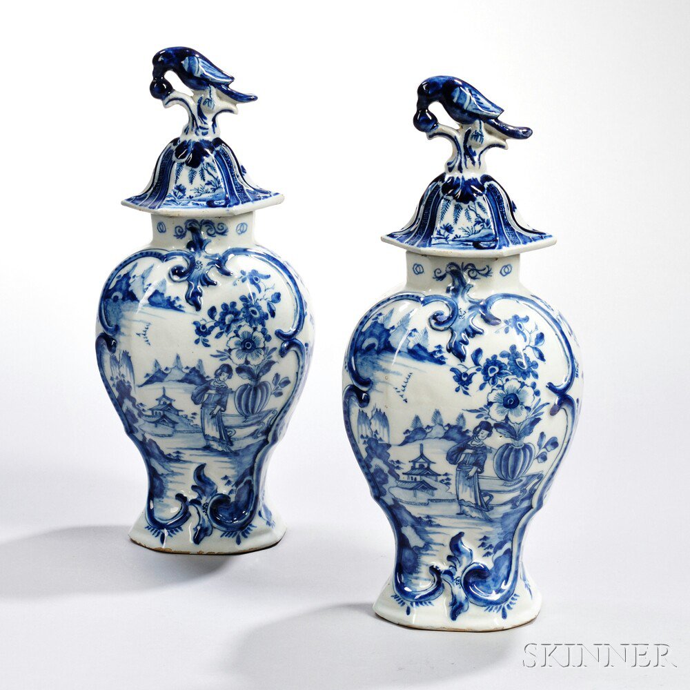 Appraisal: Pair of Dutch Delftware Blue and White Vases and Covers