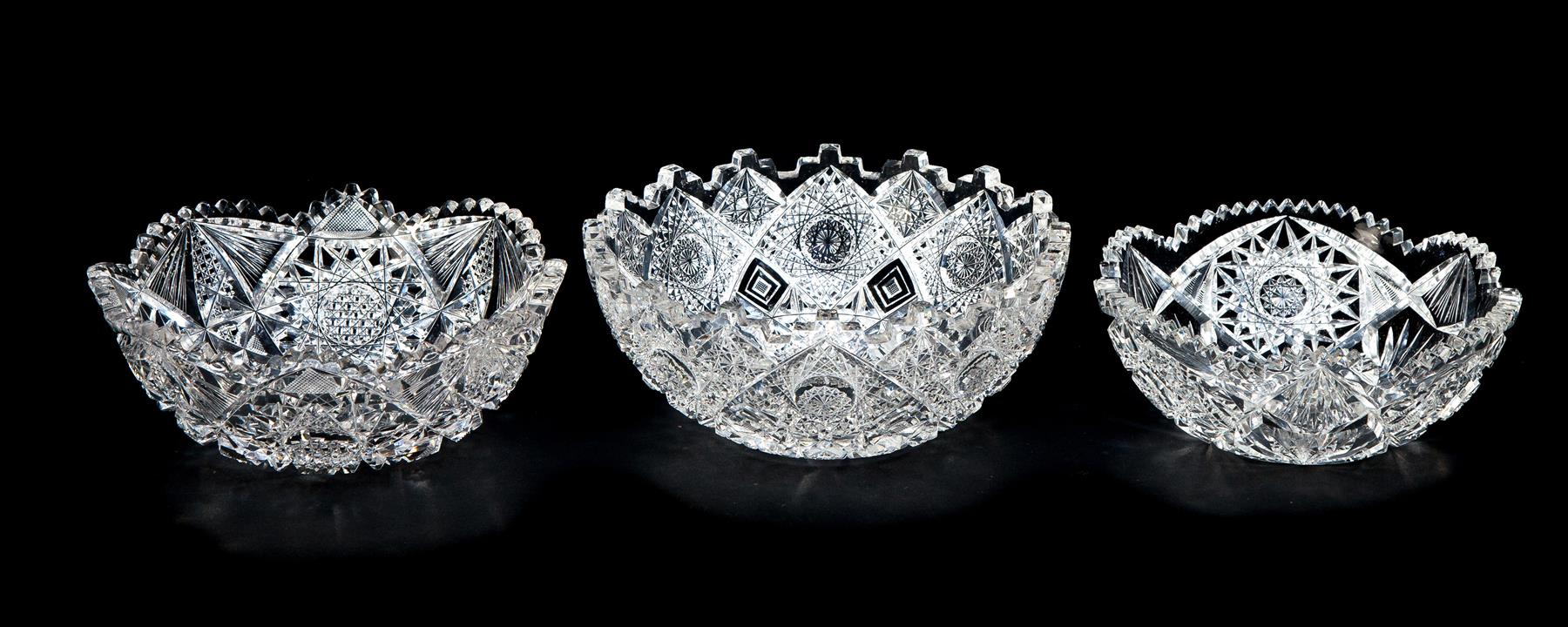 Appraisal: THREE CUT GLASS BOWLS American th century Extreme heavy cutting