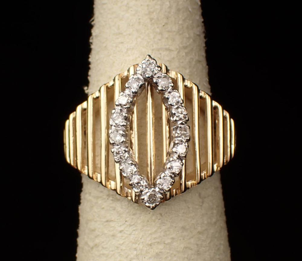 Appraisal: DIAMOND AND FOURTEEN KARAT GOLD RING The yellow and white